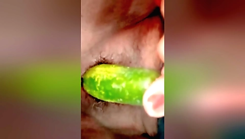 Indian housewife fucks herself with a cucumber and dildo