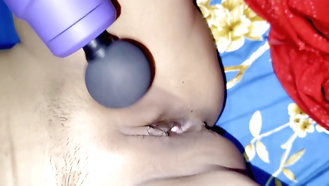 Indian girl masturbates with a dildo in solo porn clip