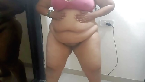 Sexy brunette in a sexy outfit is on camera in front of her boyfriend