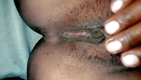 Indian girl fingers her hairy pussy in her village