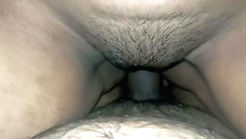 Indian babe with a sexy face has a shaved pussy and hair
