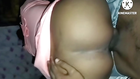 A milf is fucked with a toy on her back and in her pussy