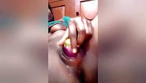 Indian slut in sexy dress masturbates with vibrator