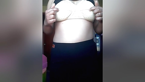 Solo female masturbation with a hair falling out of her vagina