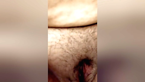 Indian hairy chick is fingering herself on the bed