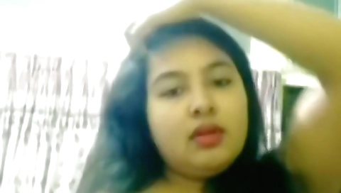 Skinny indian chick has big natural boobs on a white sheet