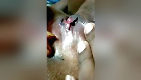 Indian girl masturbates in bed by her favorite clothes