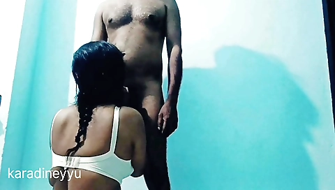Indian brunette with small tits is doing a hot blowjob