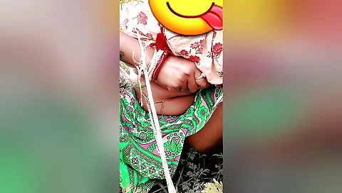 Indian style solo girl walks on the grass in the park