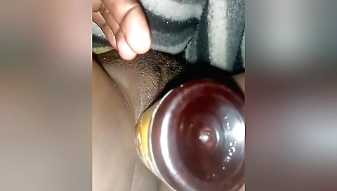 Hairy girl takes off her clothes and toys her hairy pussy