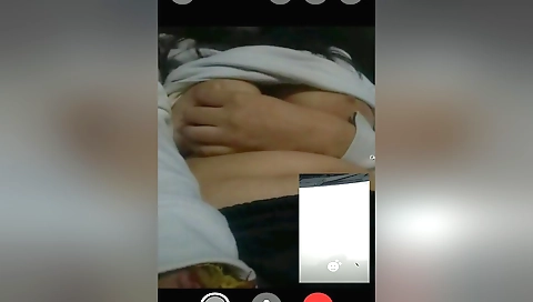 Indian beautie wearing a sexy outfit in a solo webcam vid