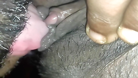 Indian girl is fingering her face and she is getting a blowjob