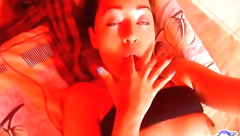 Horny brunette with a big round ass is masturbating