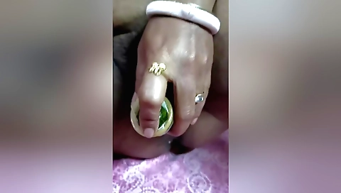 Indian girl masturbates with a dildo in amateur porn