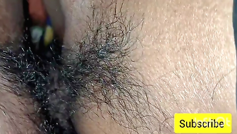 Hot amateur hairy girl is having sex in a homemade video