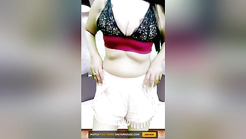 Indian brunette girl with natural boobs takes off her clothes