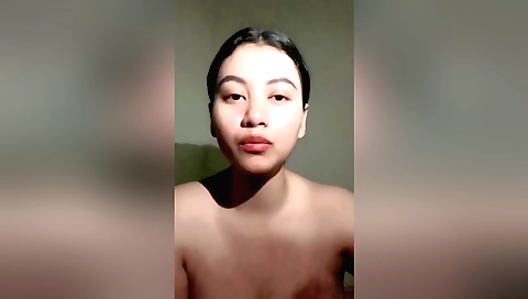 Indian woman masturbating on a bed in a homemade video
