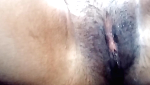 Hairy girl with a nice body is showing off in a homemade solo