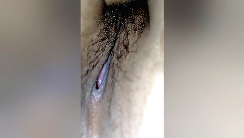 Indian woman rubs her hairy pussy till she gets off