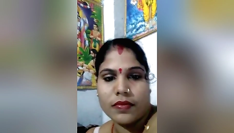 Busty Indian milf strips naked and shows her big ass