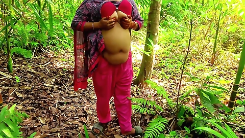 Busty brunette is getting fucked outdoors in the jungle